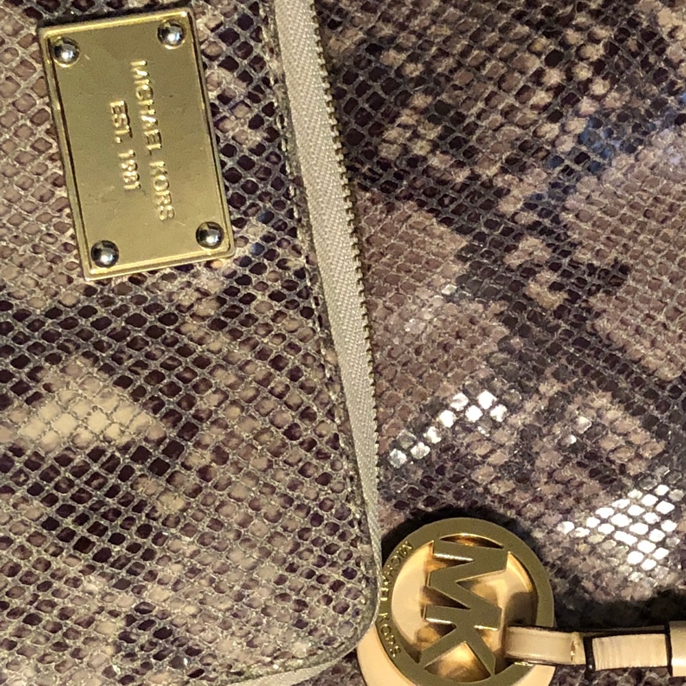 Authentic Michael Kors purse and matching wallet